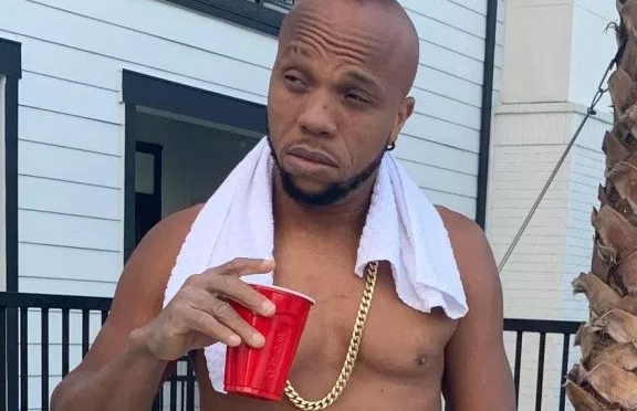 Charles Okocha shows off bullet wounds