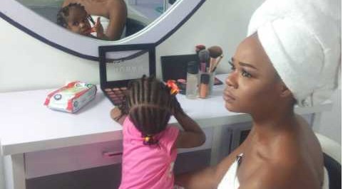 Olajumoke pictured in a towel