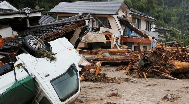 At least 11 missing as heavy rain pounds Japan