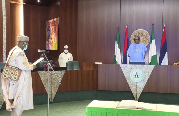 Buhari Swears in Prof Yakubu for a Second Tenure as INEC Chairman