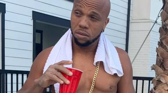 Charles Okocha shows off bullet wounds