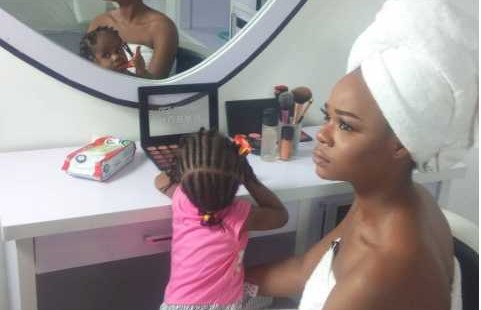 Olajumoke pictured in a towel