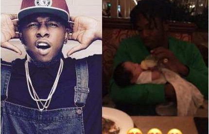 Runtown shows a responsive daddy duties