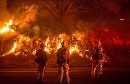 At least 23 dead, as winds fan California wildfires