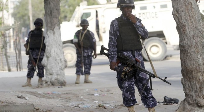 Suicide bomber disguises as police kills at least 15 in Mogadishu